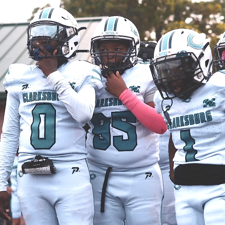 Clarksburg 11U players wearing prostate cancer awareness uniforms