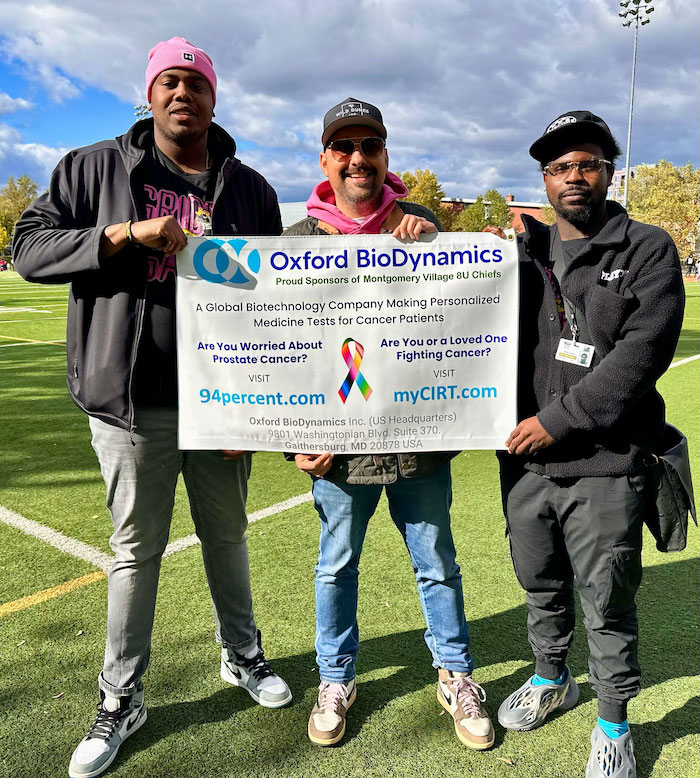 MV Chiefs' Head Coach Trae Addison (left) and Offensive Coordinator Shak Smith (right) with OBD Vice President, Joe Abdo before kickoff.